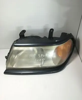Mitsubishi Pajero Sport I Headlight/headlamp 10087415