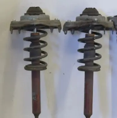 Audi A6 S6 C6 4F Front shock absorber with coil spring