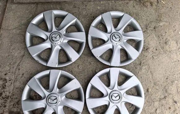 Mazda 3 II R15 wheel hub/cap/trim BBP337170