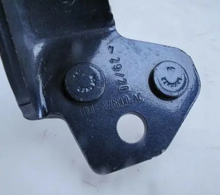 Rear door upper hinge