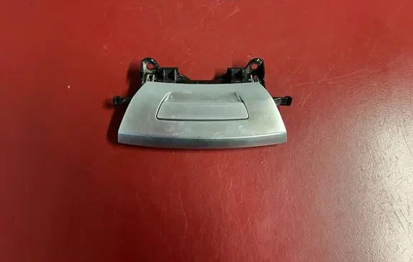 Glove box handle