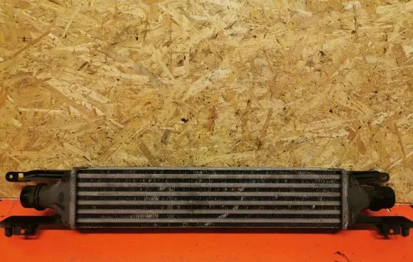 Opel Corsa D Intercooler radiator 55702004