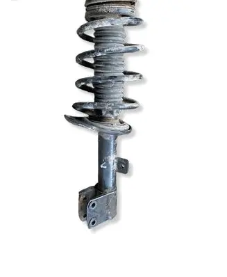 Citroen Berlingo Front shock absorber with coil spring 