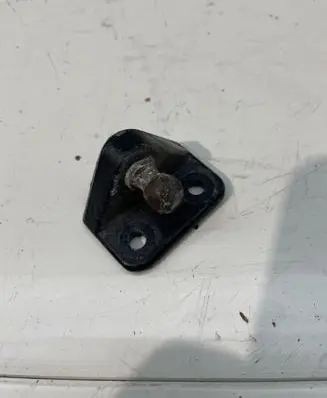 Front door check strap stopper