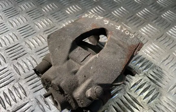 Volkswagen Golf VI Front brake caliper