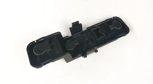 Tail light bulb cover holder
