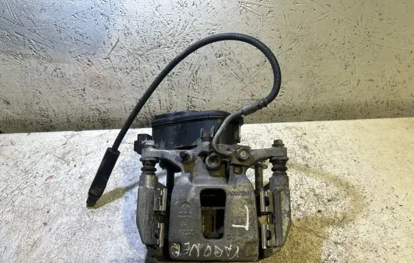 Jeep Grand Wagoneer Rear brake caliper A007D147