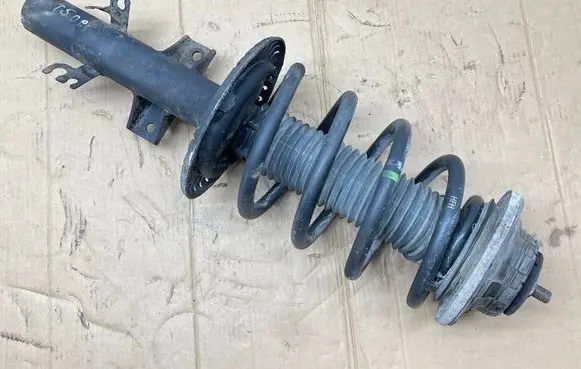 Front shock absorber with coil spring