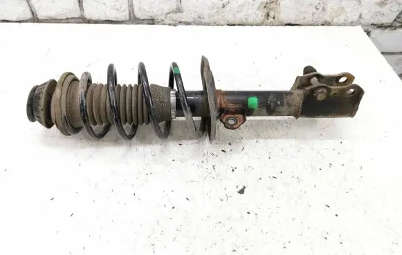 Toyota Yaris Front shock absorber with coil spring