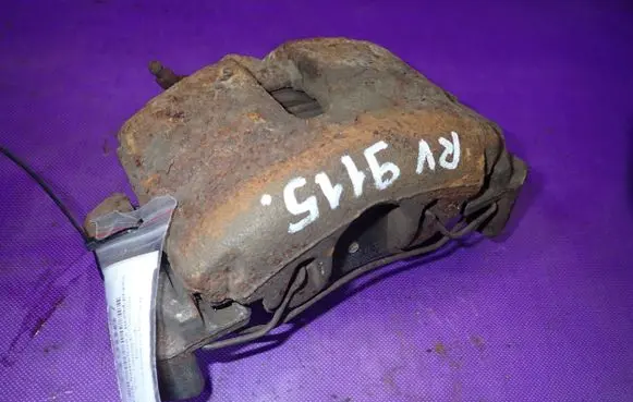 Volkswagen Touran I Front brake caliper