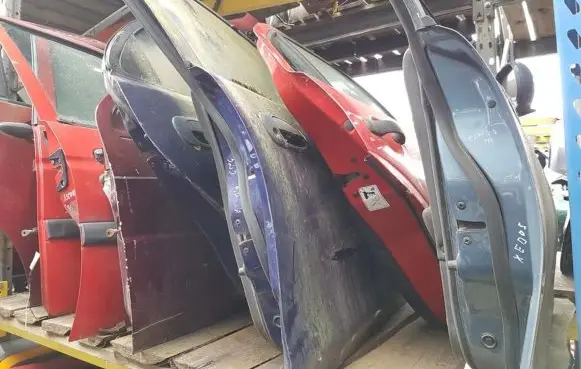 Mazda 323 Rear door MELYNOS