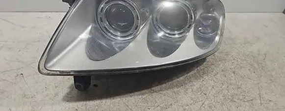 Volkswagen Touareg I Headlight/headlamp 7L6941015CF 89307851 1002A5394