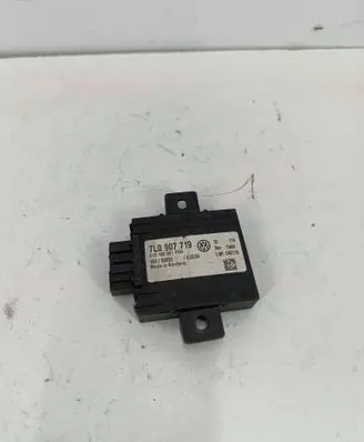 Volkswagen Touareg I Alarm control unit/module 7L0907719
