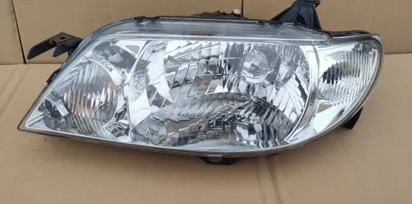 Mazda 323 F Headlight/headlamp 9886-9885