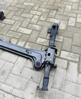 Radiator support slam panel bracket