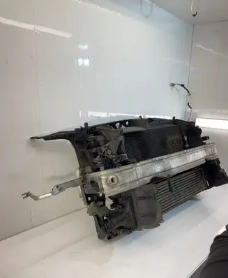 Radiator support slam panel
