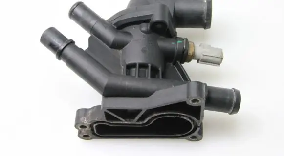 Thermostat/thermostat housing