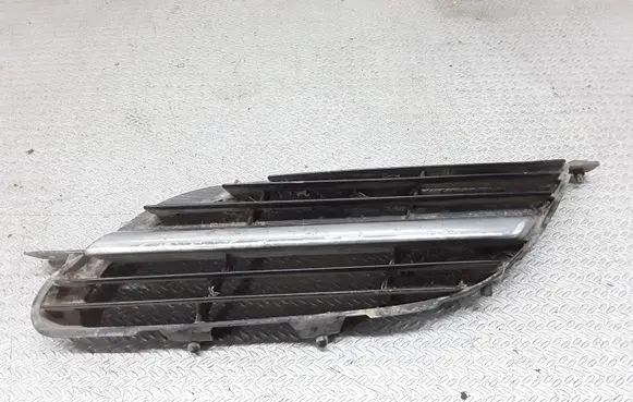 Nissan Almera Tino Front bumper upper radiator grill 62317BU100