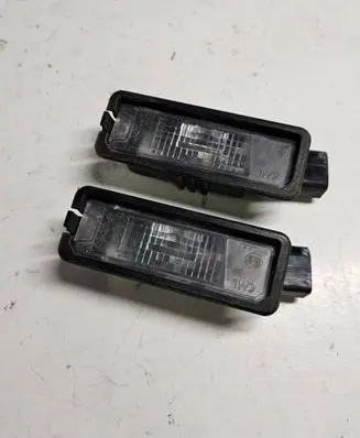 Volkswagen Golf VI Number plate light 1K8943021