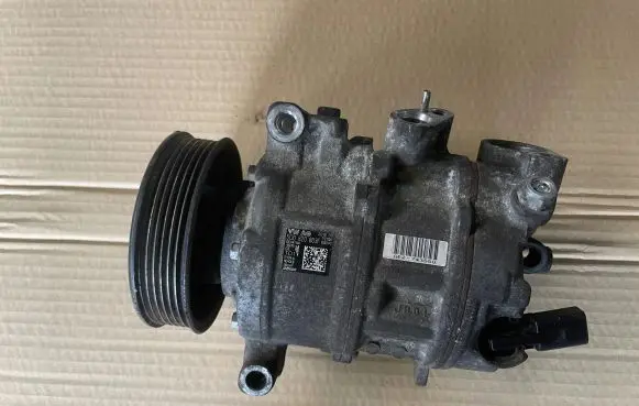 Volkswagen Golf VII Air conditioning (A/C) compressor (pump) 5Q0820803F