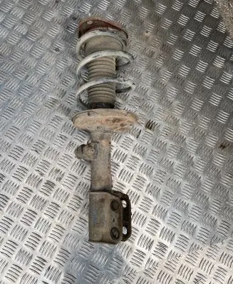 Front shock absorber with coil spring