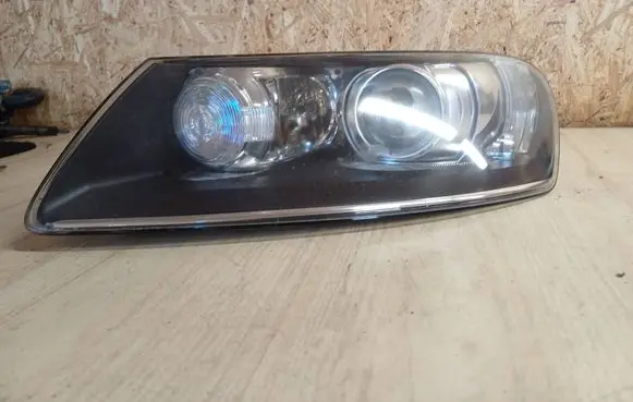 Volkswagen Touareg I Headlight/headlamp 89399391