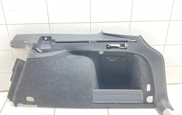 Trunk/boot lower side trim panel