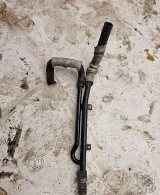 Volkswagen Touareg II Engine coolant pipe/hose 7P6121070AP