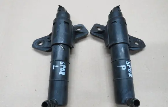 KIA Sportage Headlight washer spray nozzle 00066134