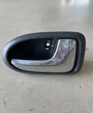 Mazda 323 Rear door interior handle