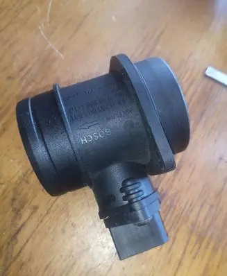 Volkswagen Touran I Mass air flow meter 0281002531 038906461B