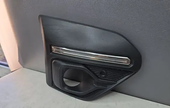 Dacia Sandero III Front fog light trim/grill EABR261A20