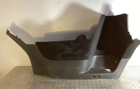 Trunk/boot lower side trim panel