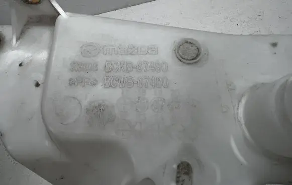 Mazda CX-30 Windshield washer fluid reservoir/tank BCKB67480
