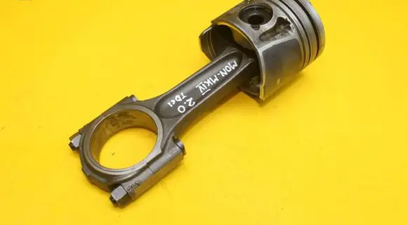 Piston with connecting rod