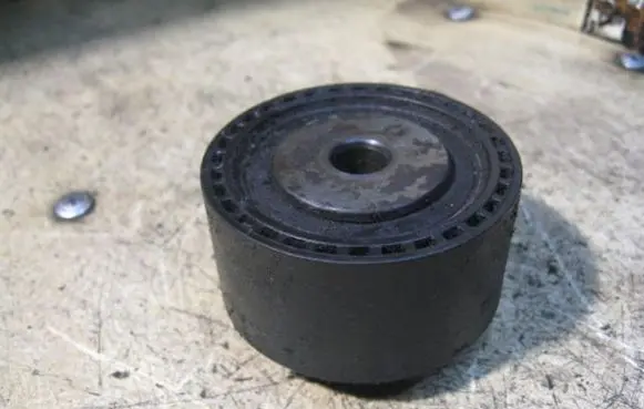 Timing belt tensioner pulley