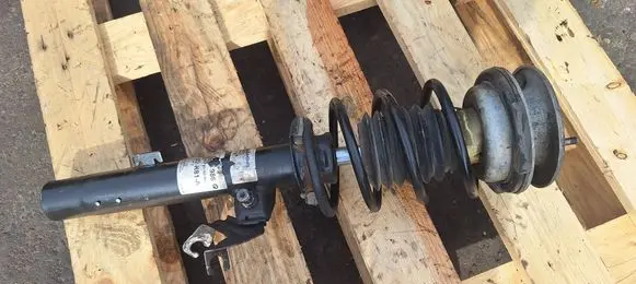 Front shock absorber with coil spring