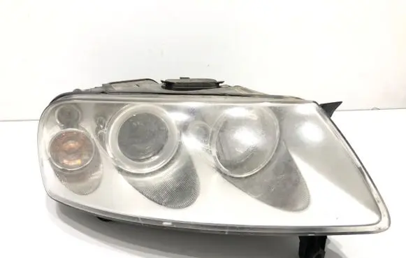Volkswagen Touareg I Headlight/headlamp 7L6941016CE