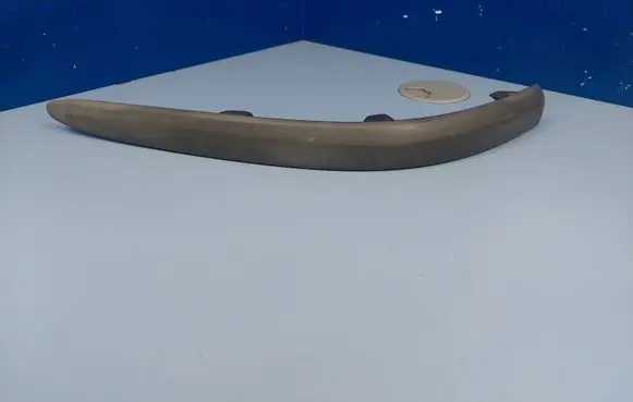 Rear bumper trim bar molding