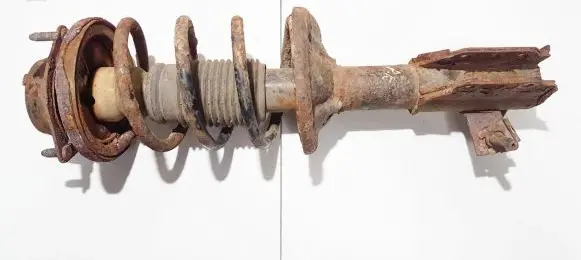 Mazda 323 F Front shock absorber/damper