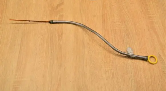 Oil level dip stick