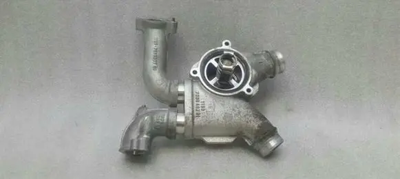 Thermostat/thermostat housing