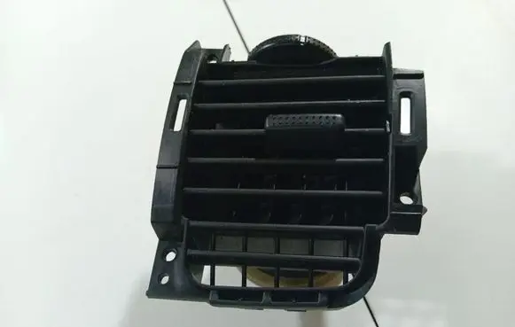 Dash center air vent grill