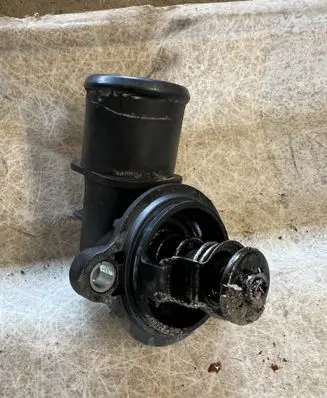 Thermostat/thermostat housing