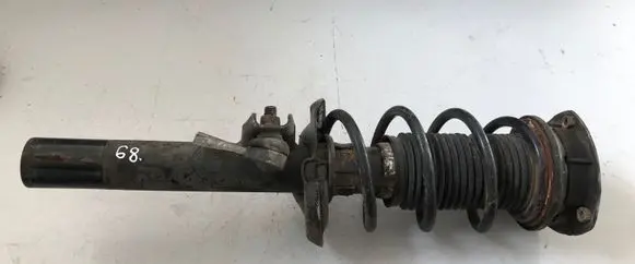 Volkswagen Golf VII Front shock absorber with coil spring 5Q0413023FK 5Q0412014KF