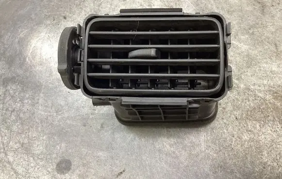 Mitsubishi Lancer Dash center air vent grill SPC00773 2R00 PPTD30
