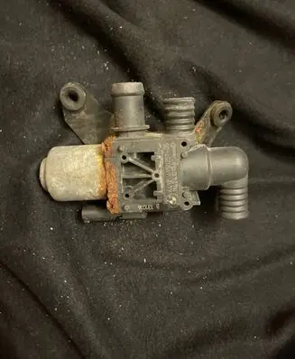 Coolant heater control valve