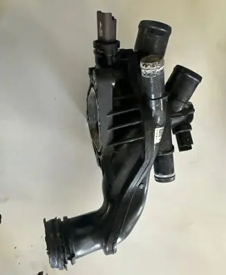 Thermostat/thermostat housing