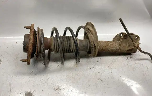 Front shock absorber with coil spring