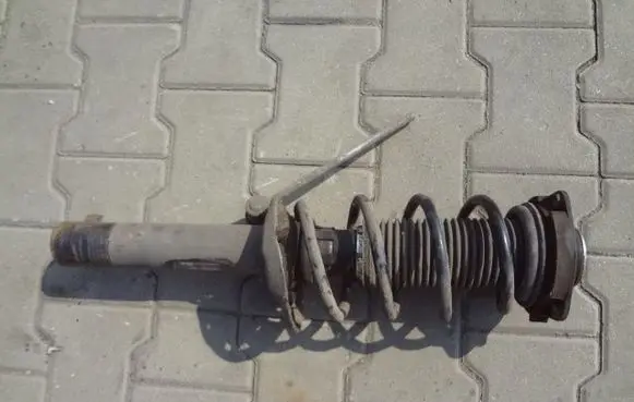 Volkswagen Golf V Front shock absorber with coil spring